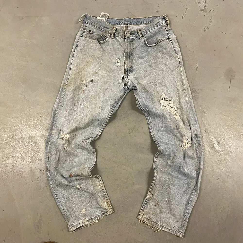 y2k thrashed baggy Levi’s 550 jeans 34x32